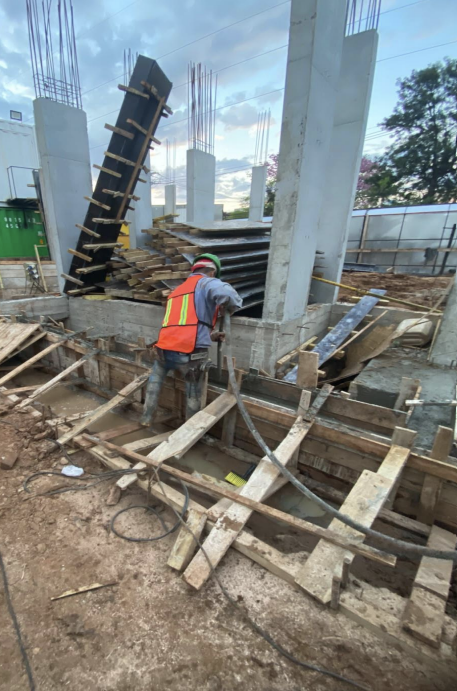 Concrete pouring of foundation pile caps and reinforced concrete columns at Park Lofts Los Arboles